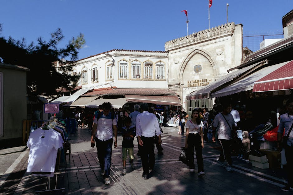 Vibrant street scene at the Grand Bazaar entrance in Istanbul, showcasing local culture and architecture